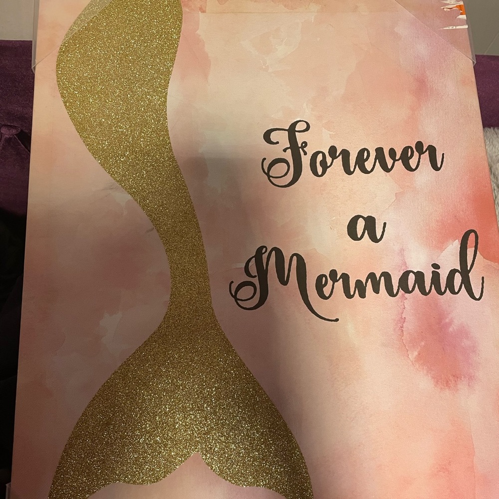 “Forver a mermaid” sign